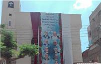 تعليق صور شهداء «مارجرجس» على كنيسة طنطا